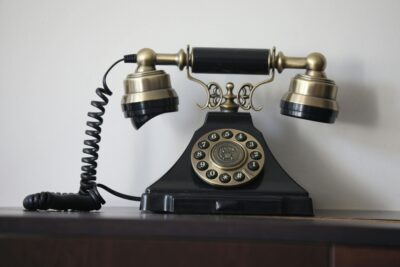 pexels.com vintage rotary dial telephone on wooden table smuldur 33349845